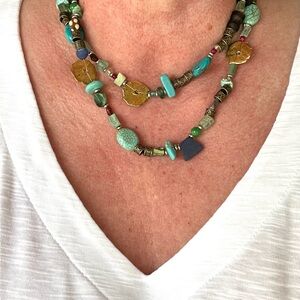 Long strand of new and vintage beads